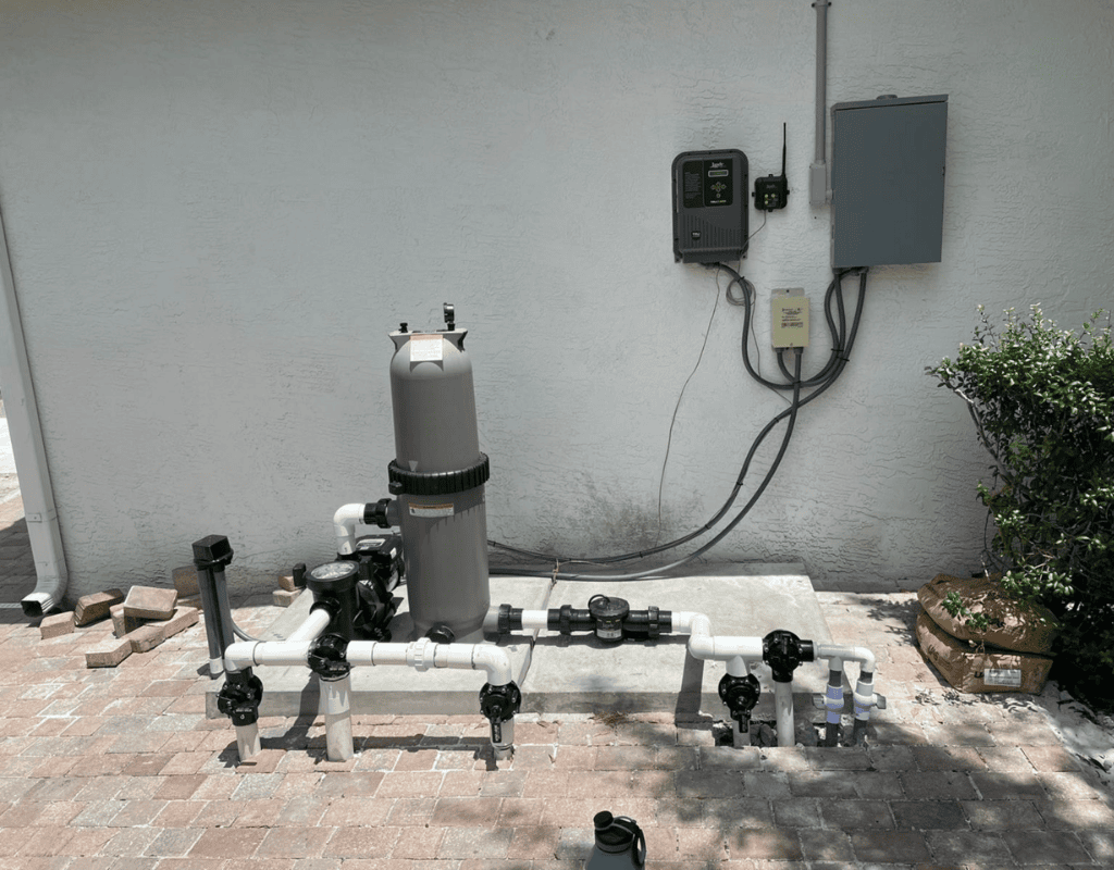 New commercial-grade pump and filter plumbing installed by Pools USA technicians in Port St. Lucie, FL.