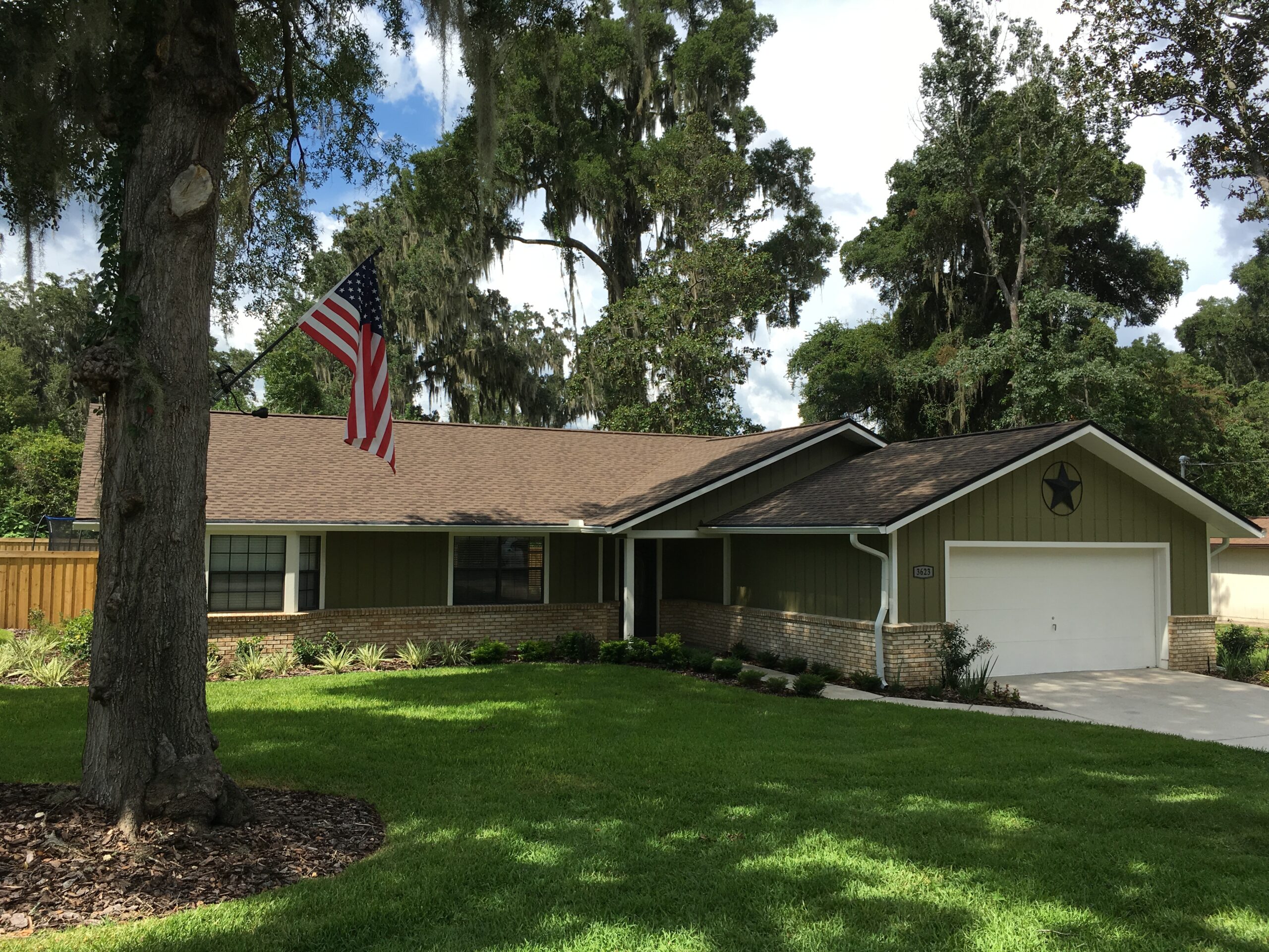 Technician from United Roofing expertly assessing roof damage in Ocala, FL home