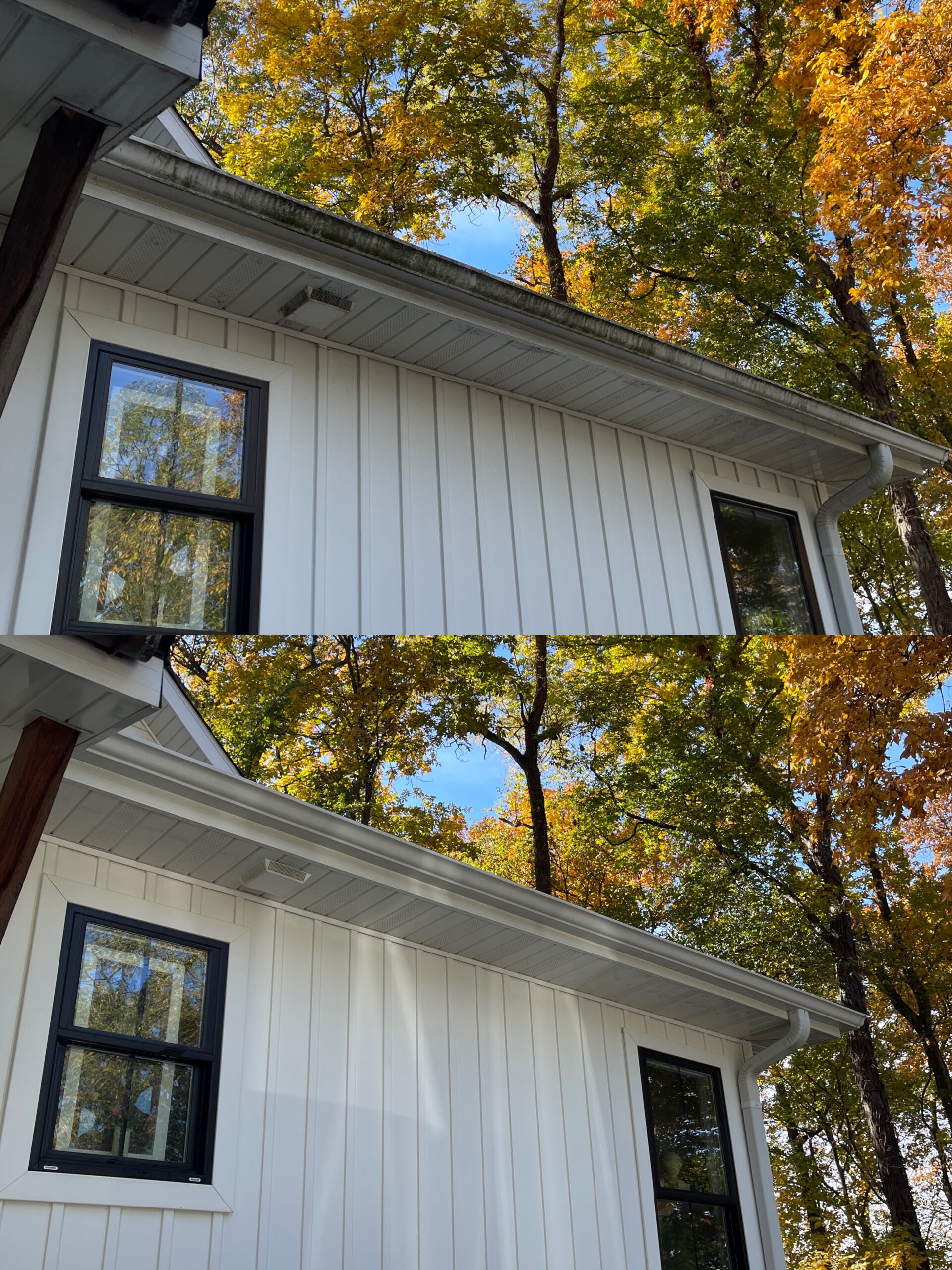 Experienced technician inspecting gutter flow and downspout blockage along roof edge